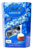 Конфеты Lindor Молочный шоколад с начинкой из белого шоколада